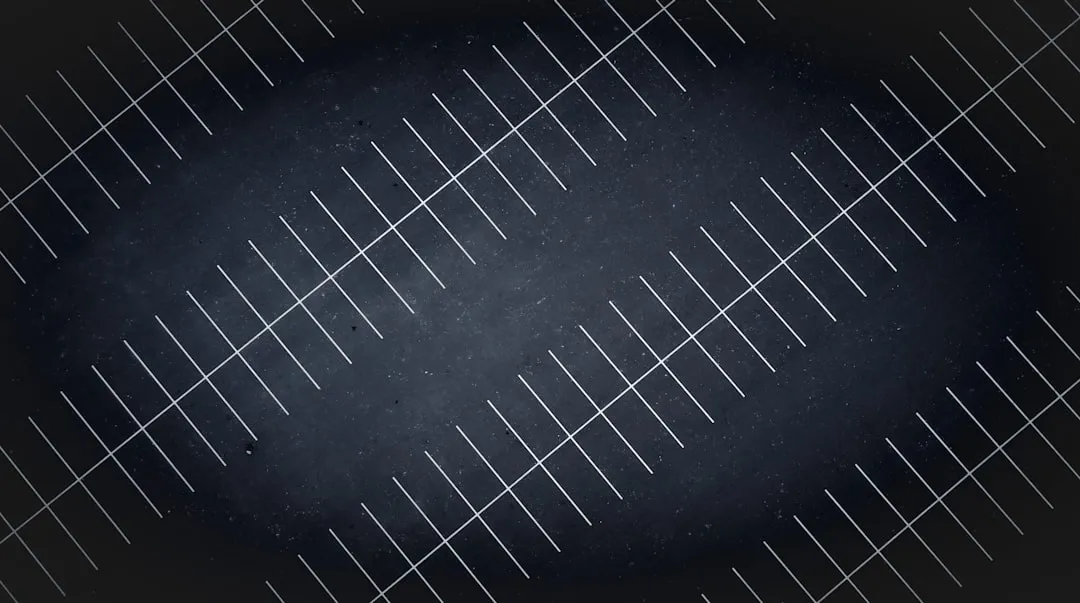 A drone view at night of parking lot lines